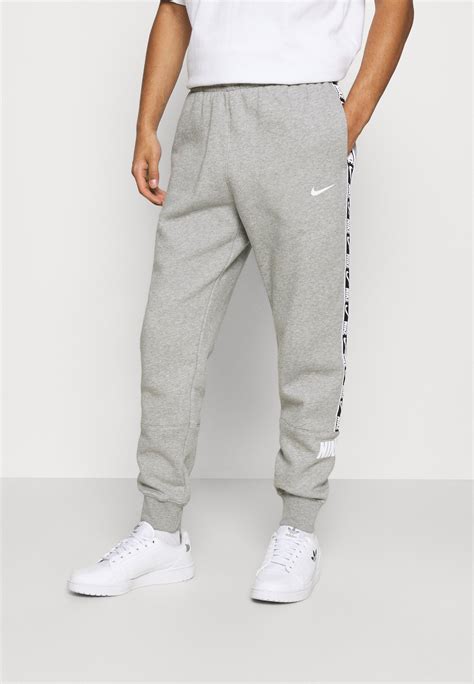 graue nike jogginghose herren|nike jogginghose unten breit.